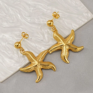 Ocean series golden starfish stud earrings with fine textured surface for women