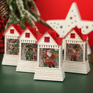 Set of 4 Christmas snow globe house lanterns with Santa and nutcracker decorations
