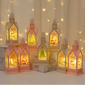 Close-up of glowing LED Christmas lanterns with Santa Claus and reindeer prints