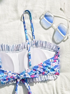 Haut de bikini bleu à fleurs avec volants et liens ajustables pour vacances à la plage