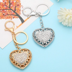 Elegant rhinestone hollow heart keychain set in gold and silver with lobster clasp
