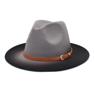 Detailed macro view of gray fedora felt texture with brown leather buckle belt decoration