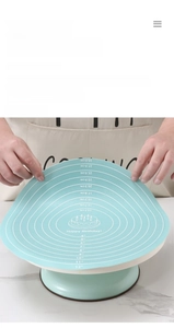 Close-up of 30cm green silicone baking mat with dual scale measurements and wavy edges