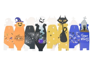 Detail view of various Halloween gift candy boxes with ghost, pumpkin and cat designs