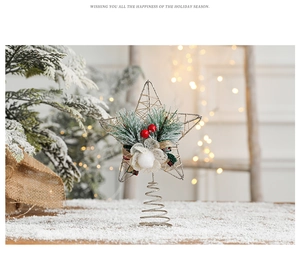 Glittery gold star tree topper with pine needles and red berries on a snowy background