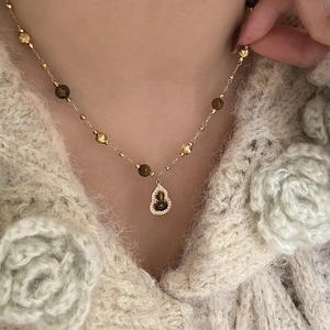 18K gold plated tiger eye gourd necklace with sparkling crystals on model