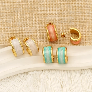 Three pairs of C-shaped resin earrings in white, pink, and green with gold plating