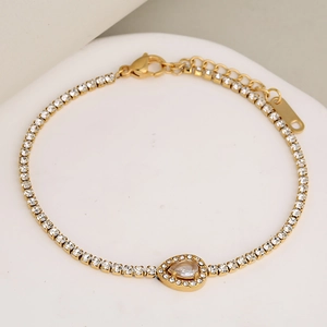 Elegant gold-plated chain bracelet with a pear-shaped rhinestone and adjustable clasp