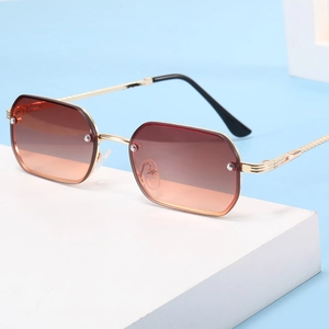Retro rimless square sunglasses with gold metal frames and brown gradient lenses