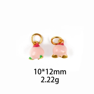 Detailed pink enamel peach charm with gold accents measuring 10x12mm for DIY jewelry