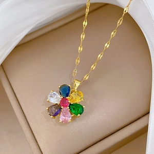 Macro shot of colorful spinning flower pendant with sparkling crystals in a gift box