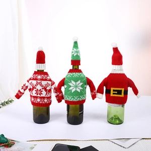 Three-piece Christmas knitted wine bottle covers featuring elk and snowflake patterns