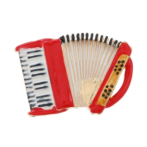Retro red accordion brooch pin with gold alloy frame and detailed enamel finish