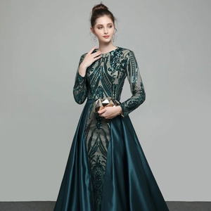 Elegant emerald green evening gown with sequined mesh top and long satin skirt with clutch