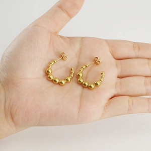 18K gold plated stainless steel C-shaped hoop earrings with graduated bead design