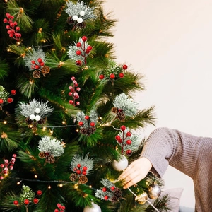 Christmas decoration picks with red berries pine cones and needles for holiday floral arrangements
