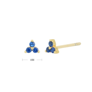 Detail view of 4mm gold S925 silver triangle stud earrings with three blue cubic zirconia