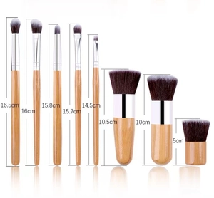 Detailed size measurement chart for 11pcs bamboo handle makeup brush set on white background