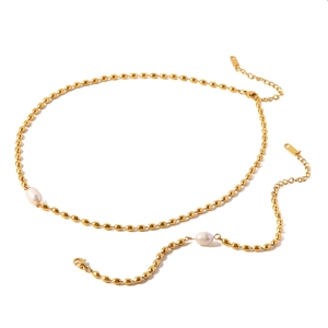 Elegant gold titanium steel jewelry set featuring oval freshwater pearls and beads