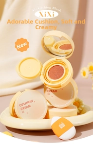 Detail view of the XiXi air cushion blush with a soft sponge applicator and mirror