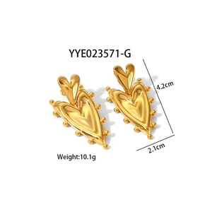 Double layered gold heart earrings with beaded edge and stainless steel finish