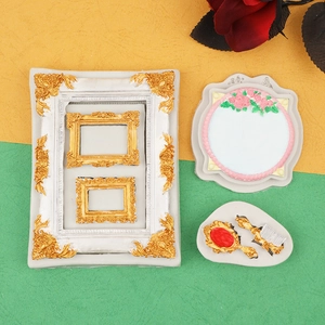 Macro shot of vintage style frame and comb silicone molds with detailed floral relief