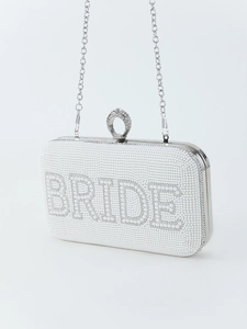 White bridal clutch bag with pearls and rhinestones featuring BRIDE lettering and chain