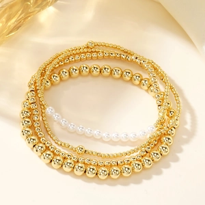 Elegant multi-layer beaded bracelet set with gold metal beads and white pearls