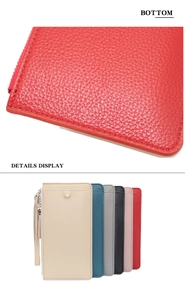 Detailed view of five colorful lychee grain leather long wallets with wrist straps