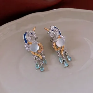 Elegant unicorn stud earrings with zircon stones and blue water-drop pendants