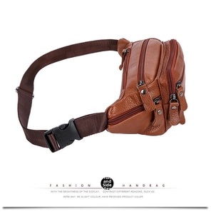 Side view of brown leather waist bag showing multiple zippers and lychee texture