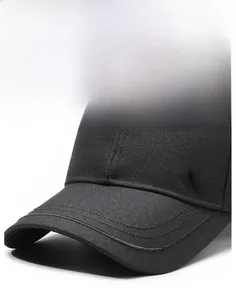 Detail of a black baseball cap featuring a stiff brim and metallic JB side logo