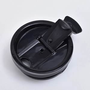 Detail view of the black leak-proof lid with flip seal for a 14oz speaker tumbler