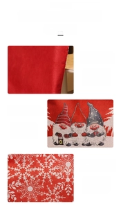 Detail of thickened Christmas chair cover with printed gnomes and white snowflake patterns