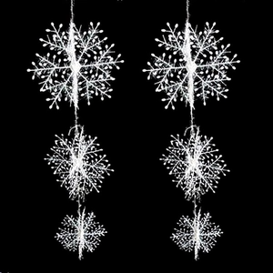 Close-up of white snowflake hanging decorations in various sizes for Christmas trees