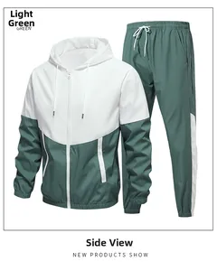 Detail view of a green and white hooded tracksuit set with zip jacket and matching pants