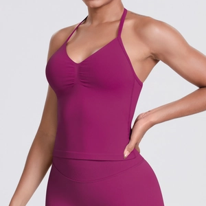 Detail of berry pink seamless yoga tank top with ruching and slender straps