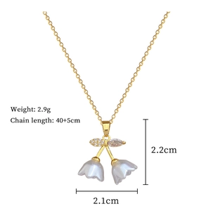 Detail view of gold bellflower necklace specs: 2.9g weight and 40+5cm chain length