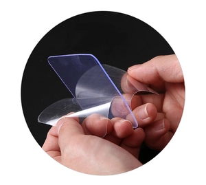 Close-up showing the high flexibility and transparency of the clear adhesive wall hook