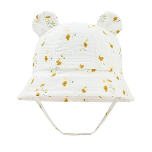 Detail of baby cotton bucket hat with cute 3D ears and yellow floral patterns