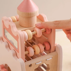 Macro detail of wooden bead maze toy with smooth pastel finish for fine motor skills