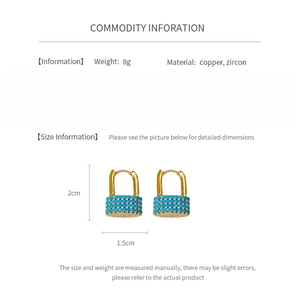 Detailed view of gold-plated lock earrings with blue zircon inlays and dimensions