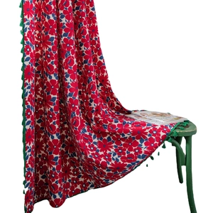 Floral cotton linen curtain with red patterns and green tassel trim for windows