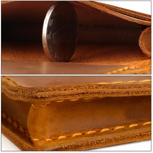 Macro shot of vintage crazy horse leather card holder edge and handmade stitching details