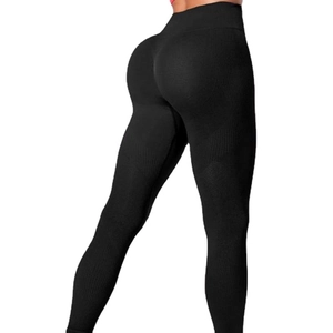 Women's black high-waisted seamless yoga pants with peach lift effect for fitness