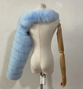 Detailed view of light blue faux fox fur shawl wrap with premium fluffy texture