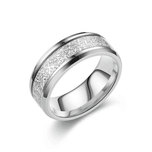 Macro detail of silver titanium steel ring featuring a unique Widmanstätten frosted pattern