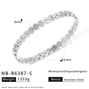 Detail showing 6mm width and 62mm diameter of silver stainless steel hollow bangle