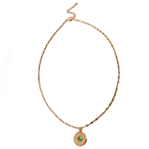 Vintage sunflower necklace in gold stainless steel with a green gemstone pendant