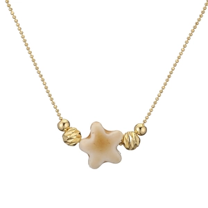 Minimalist gold beaded necklace featuring a white ceramic star pendant on white background